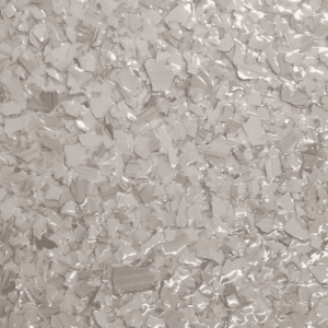 Champagne-colored epoxy flake sample for flooring, showcasing durability and aesthetic appeal in epoxy flooring solutions.