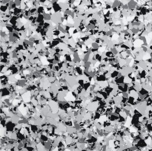 Stone Grey epoxy floor flake sample featuring a blend of grey, black, and white tones, showcasing durability and aesthetic appeal for residential and commercial spaces.