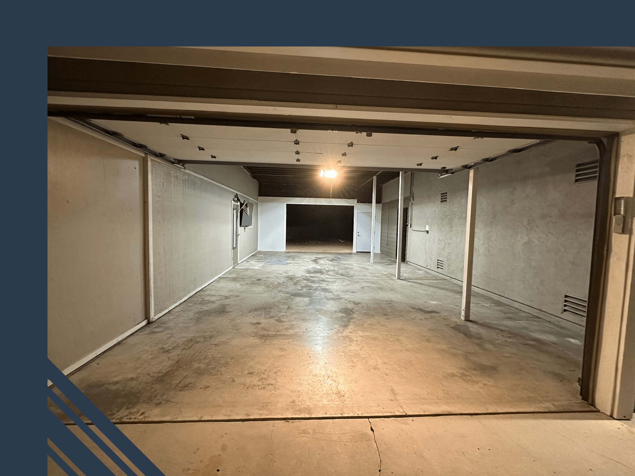 Pristine Epoxy Floor Coatings | Home Draft Empty garage space with concrete flooring, showcasing potential for epoxy flooring solutions to enhance durability and aesthetics.