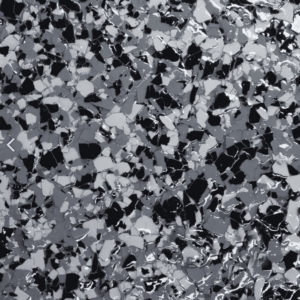 Charcoal epoxy floor flake sample showcasing a blend of dark and light tones, reflecting durability and aesthetic appeal for residential and commercial spaces.