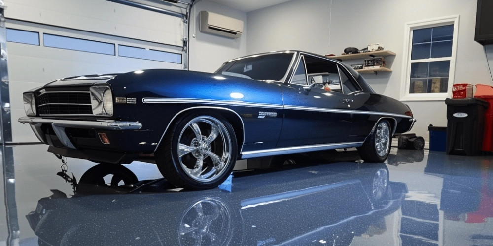 Classic car parked in a modern garage with durable flake epoxy flooring, showcasing a stylish and clean environment ideal for car enthusiasts and DIY projects.